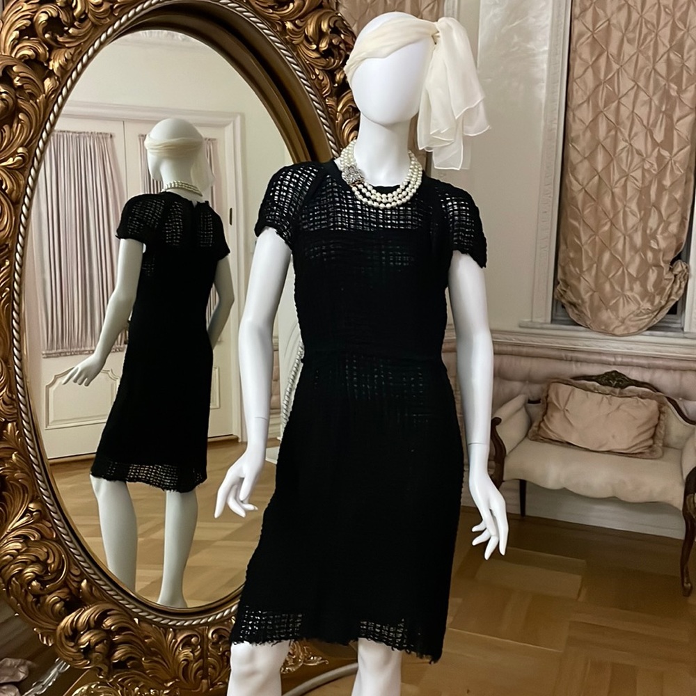 COPY - This shear elegance and style black cocktail dress is elegant and cool